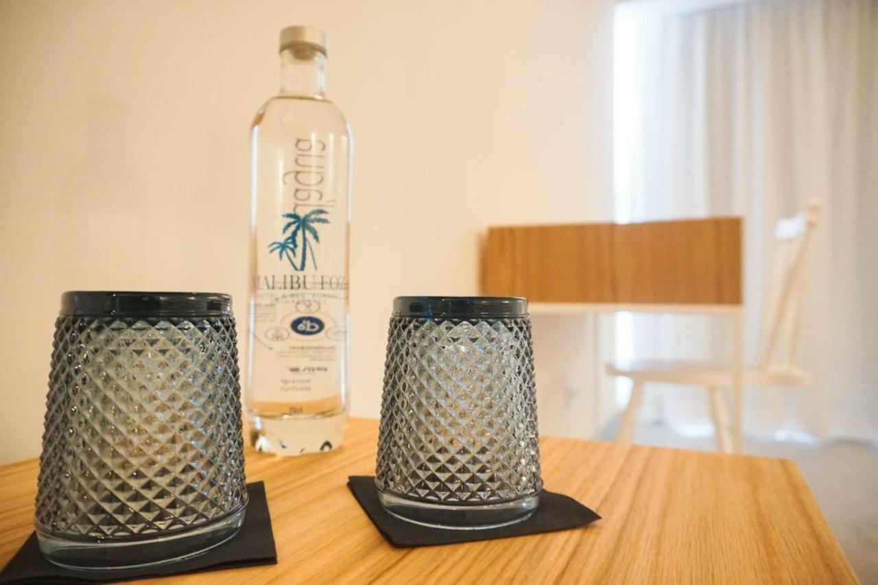 Malibu Foz Hotel - La Maison Younan Figueira da Foz Exterior foto A bottle of water