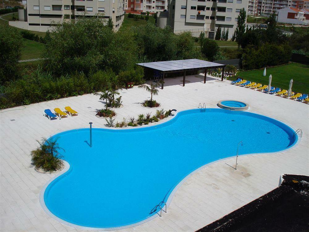 Malibu Foz Hotel - La Maison Younan Figueira da Foz Exterior foto Swimming pool in the complex