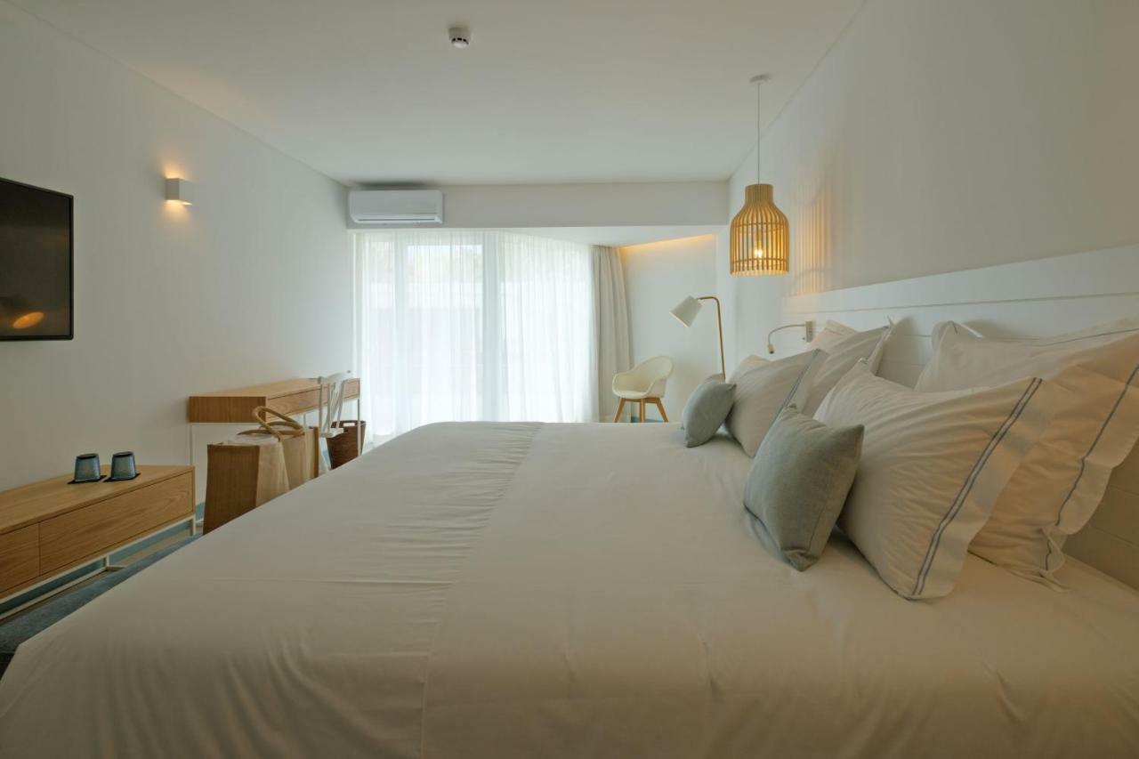Malibu Foz Hotel - La Maison Younan Figueira da Foz Exterior foto A room at the hotel