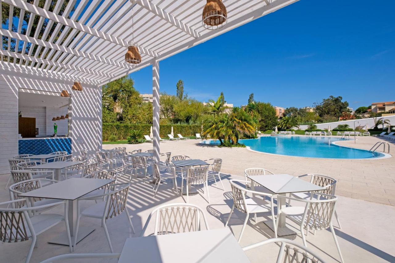 Malibu Foz Hotel - La Maison Younan Figueira da Foz Exterior foto The pool at the hotel